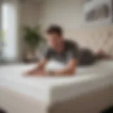 Comfort testing memory foam topper in store