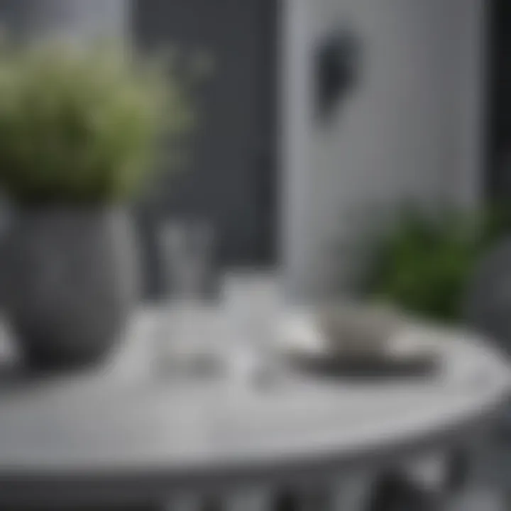 Close-up of a small grey outdoor table with decorative elements